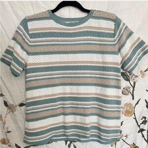 Light turquoise, white, and cream striped knitted blouse